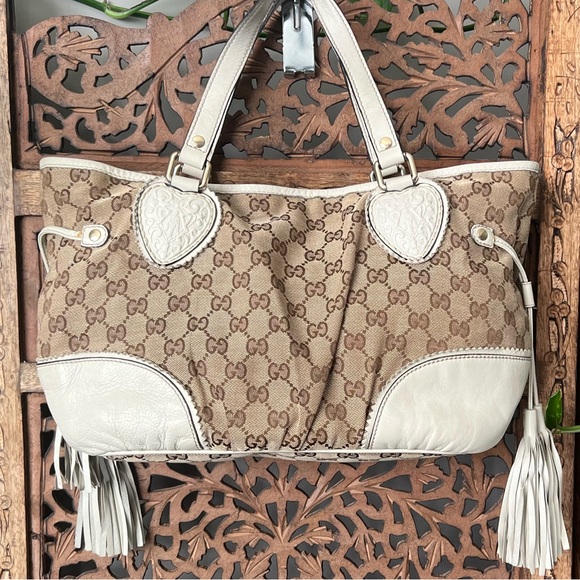 Gucci Handbags - Gucci GG Mono beige / brown shoulder bag with tassels